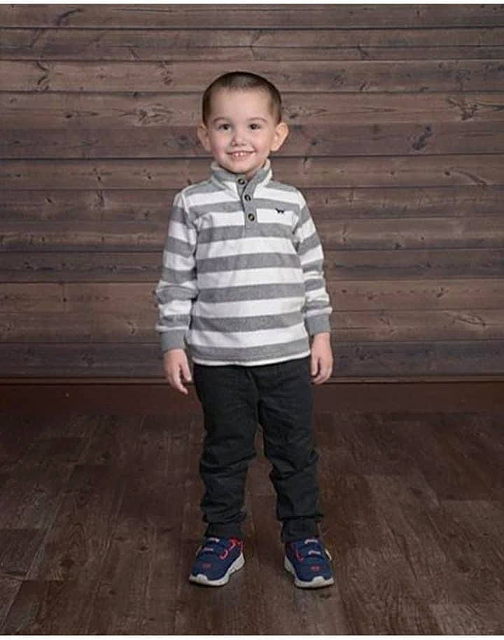 Paul is registered to the contest to win money with this photo: baby_toddler_clothing, cool, floor, flooring, hardwood, joy, khaki, leg, pattern, person, product, shirt, shoe, shoulder, sleeve, sneakers, standing, style, t_shirt, toddler