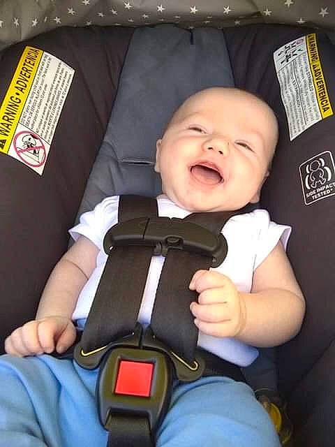 Mason is registered to the contest to win money with this photo: auto_part, baby, baby_carriage, baby_in_car_seat, baby_products, car_seat, child, person, product, seat_belt, toddler