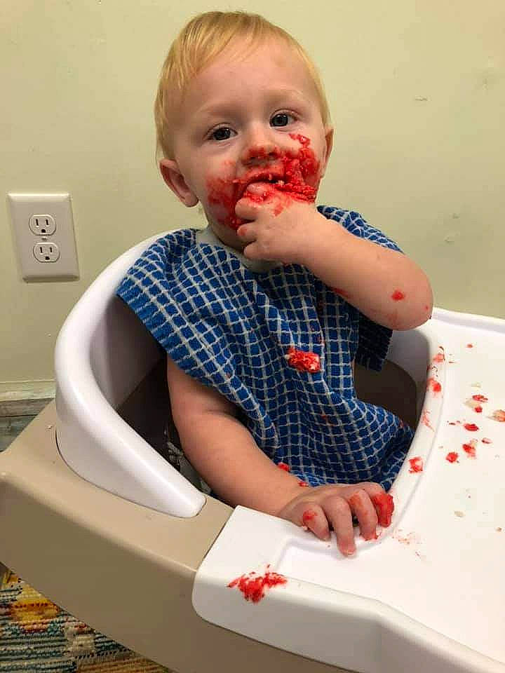 Grayson joined the competition — help win amazing prizes! arm, baby, baby_toddler_clothing, biting, child, dress, eye, face, finger, food_craving, fruit, gesture, hand, happy, mouth, nose, person, sitting, sleeve, t_shirt