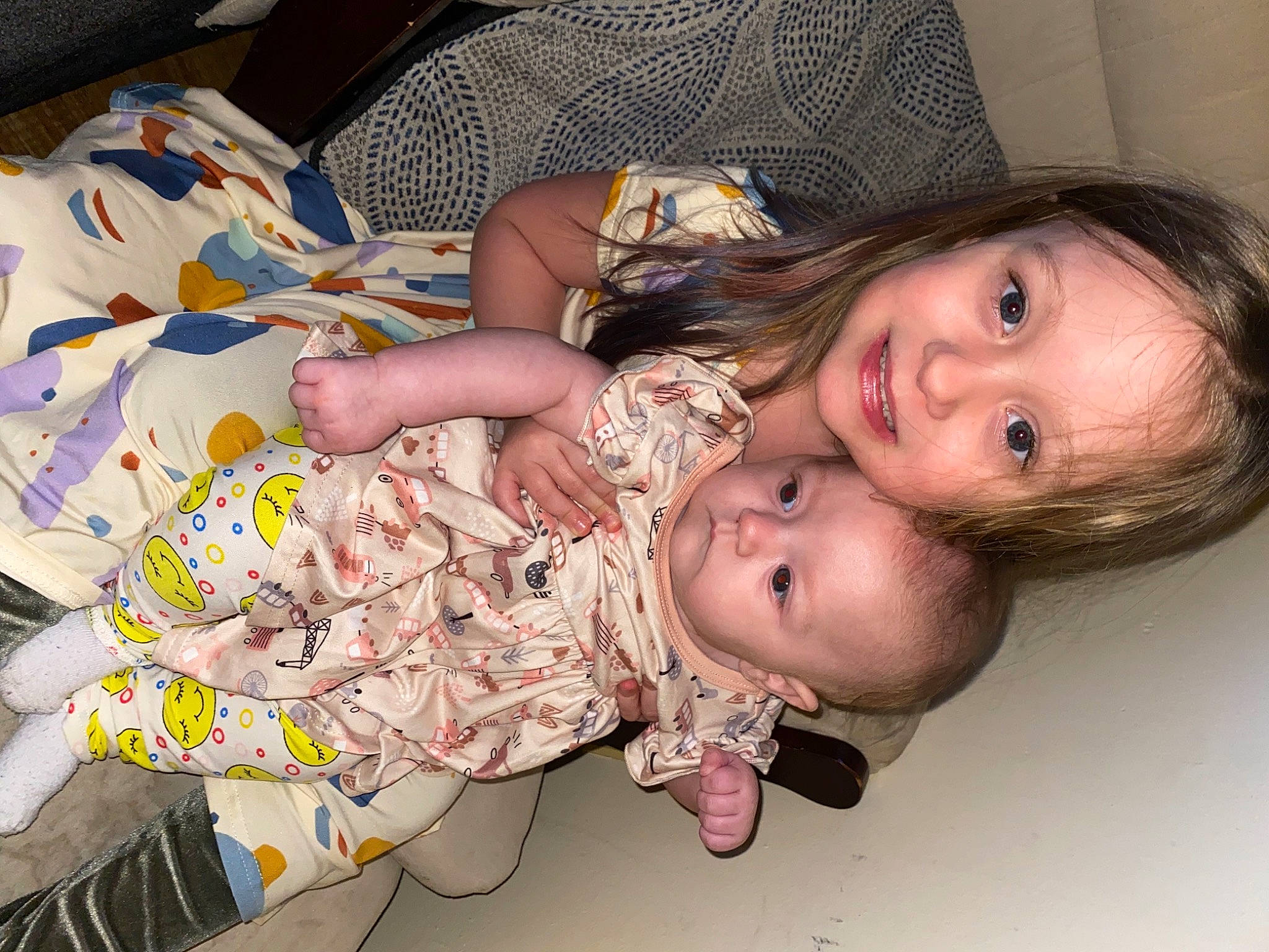 Kaylee joined the competition — help win amazing prizes! baby, baby_toddler_clothing, cheek, child, comfort, eye, face, flooring, fun, happy, iris, joy, lip, mouth, nose, pattern, person, room, sitting, skin