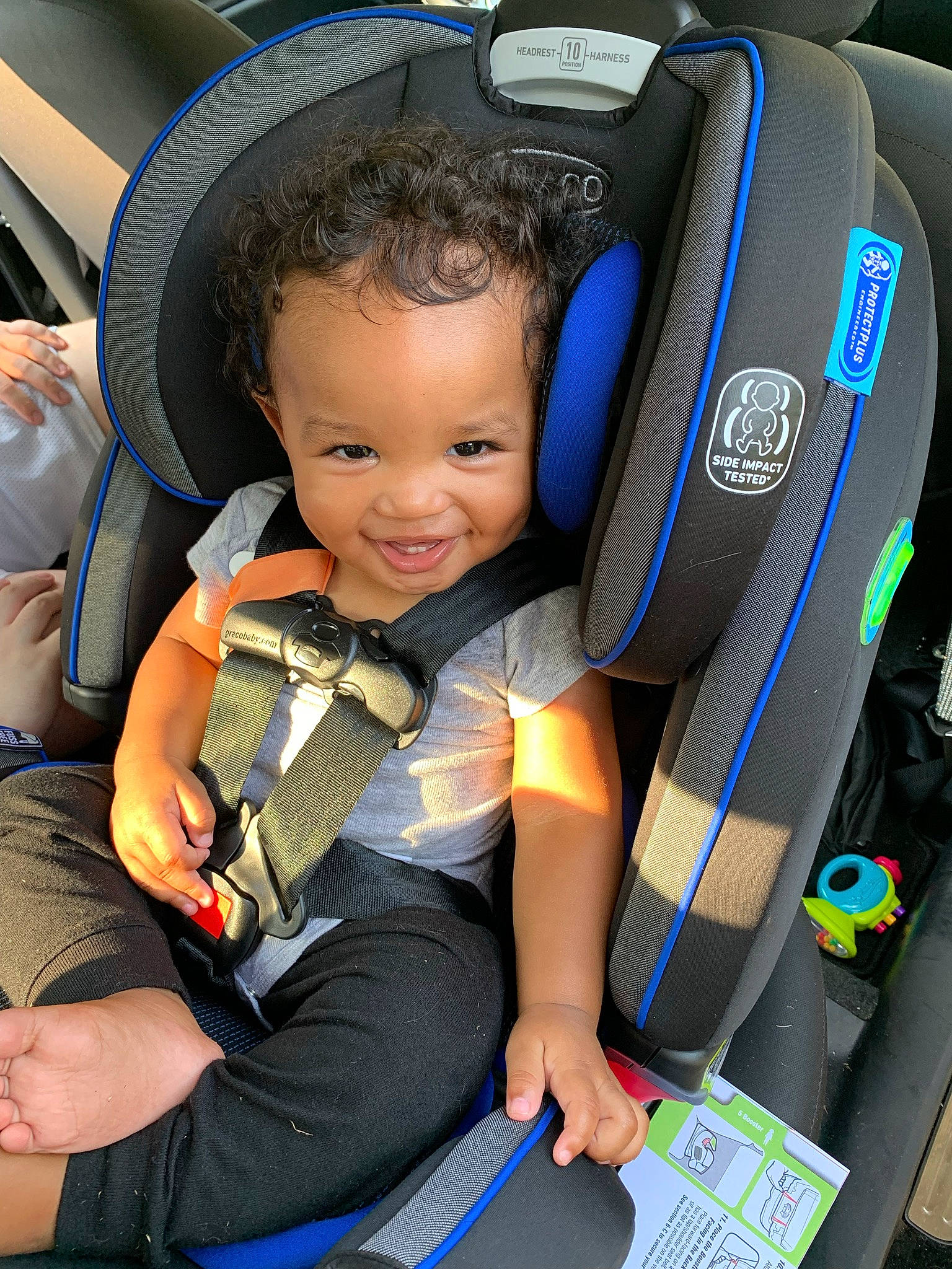 Chandler joined the competition — help win amazing prizes! auto_part, automotive_design, baby_carriage, baby_in_car_seat, blue, car_seat, car_seat_cover, child, comfort, electric_blue, fun, head_restraint, joy, motor_vehicle, person, product, seat_belt, smile, steering_wheel, toddler