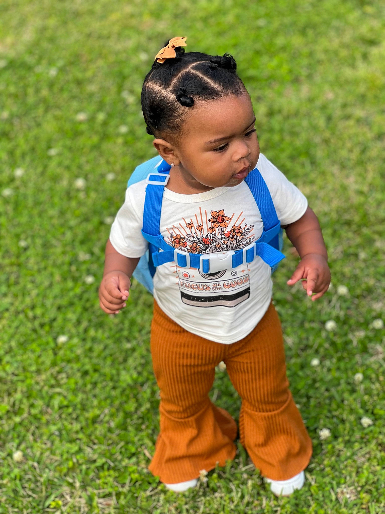 Everleigh joined the competition — help win amazing prizes! baby, baby_toddler_clothing, child, electric_blue, face, fun, grass, grassland, hair, happy, head, leisure, pattern, people_in_nature, person, plant, recreation, sleeve, soil, t_shirt