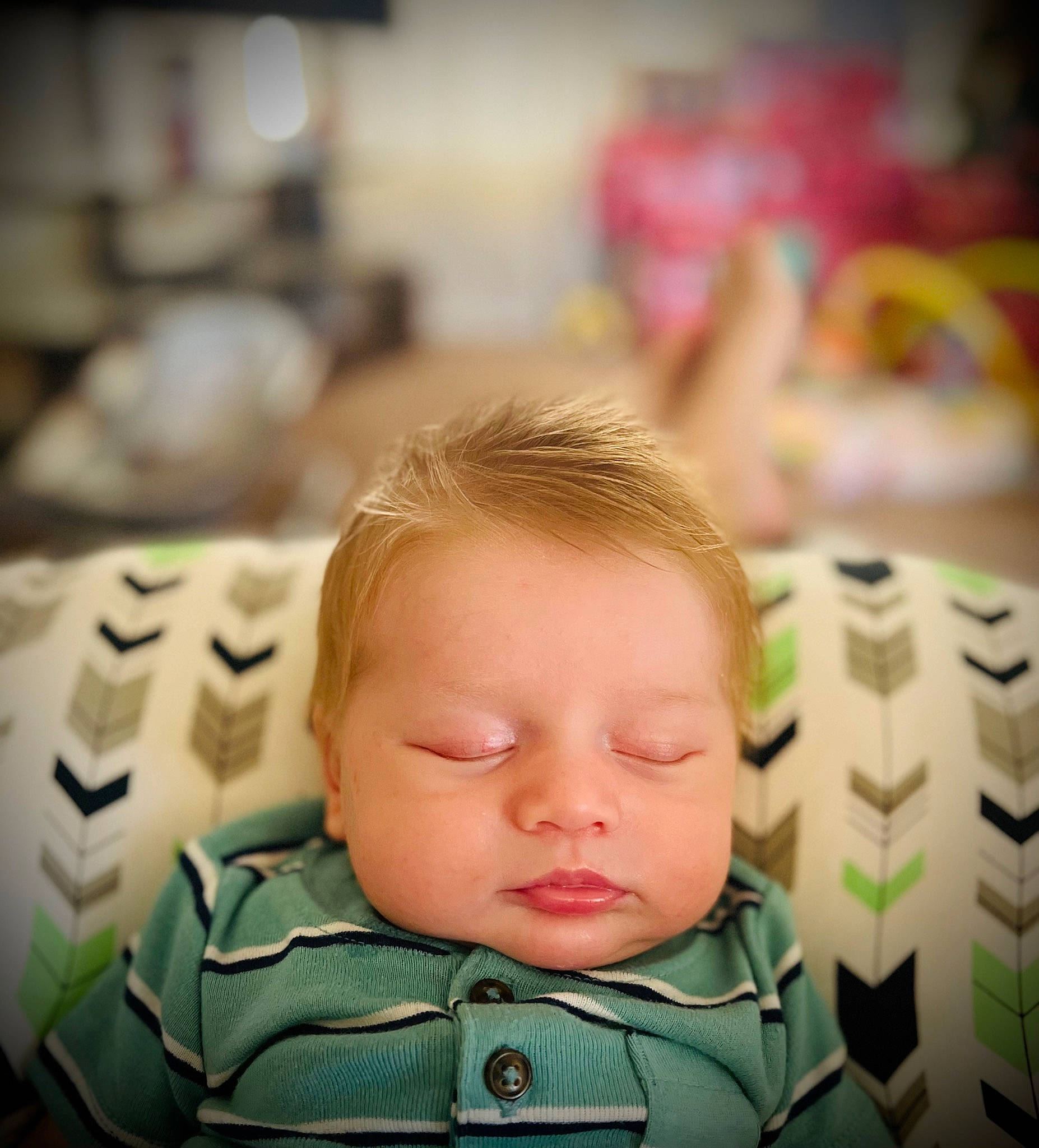 Creed is registered to the contest to win money with this photo: automotive_tire, baby, baby_toddler_clothing, cheek, child, comfort, flash_photography, flooring, fun, grass, hair, happy, leisure, person, portrait_photography, product, room, sitting, skin, toddler