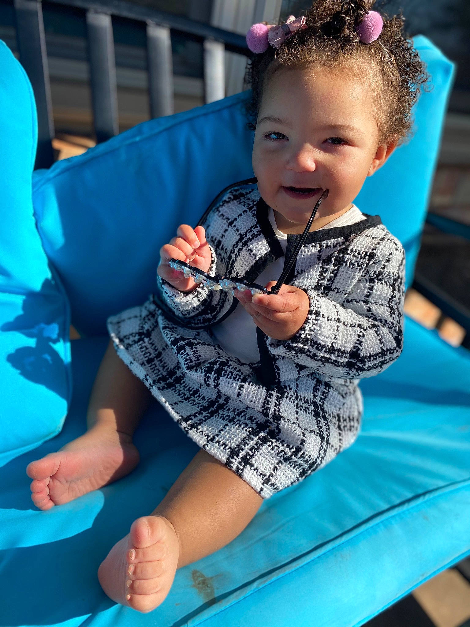 Alyson is registered to the contest to win money with this photo: ankle, aqua, baby, baby_products, baby_toddler_clothing, barefoot, child, finger, foot, hair_accessory, joy, lap, nail, overall, person, thumb, toddler, toe