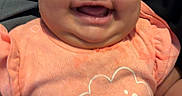 Amiyah Renee joined the competition — help win amazing prizes! baby, child, infant, smiling, laughing, portrait, close_up, indoor, seated, peach_outfit, hearts, cloud_design, cushions, clothing, happy, face, eyes, mouth, cozy, photography