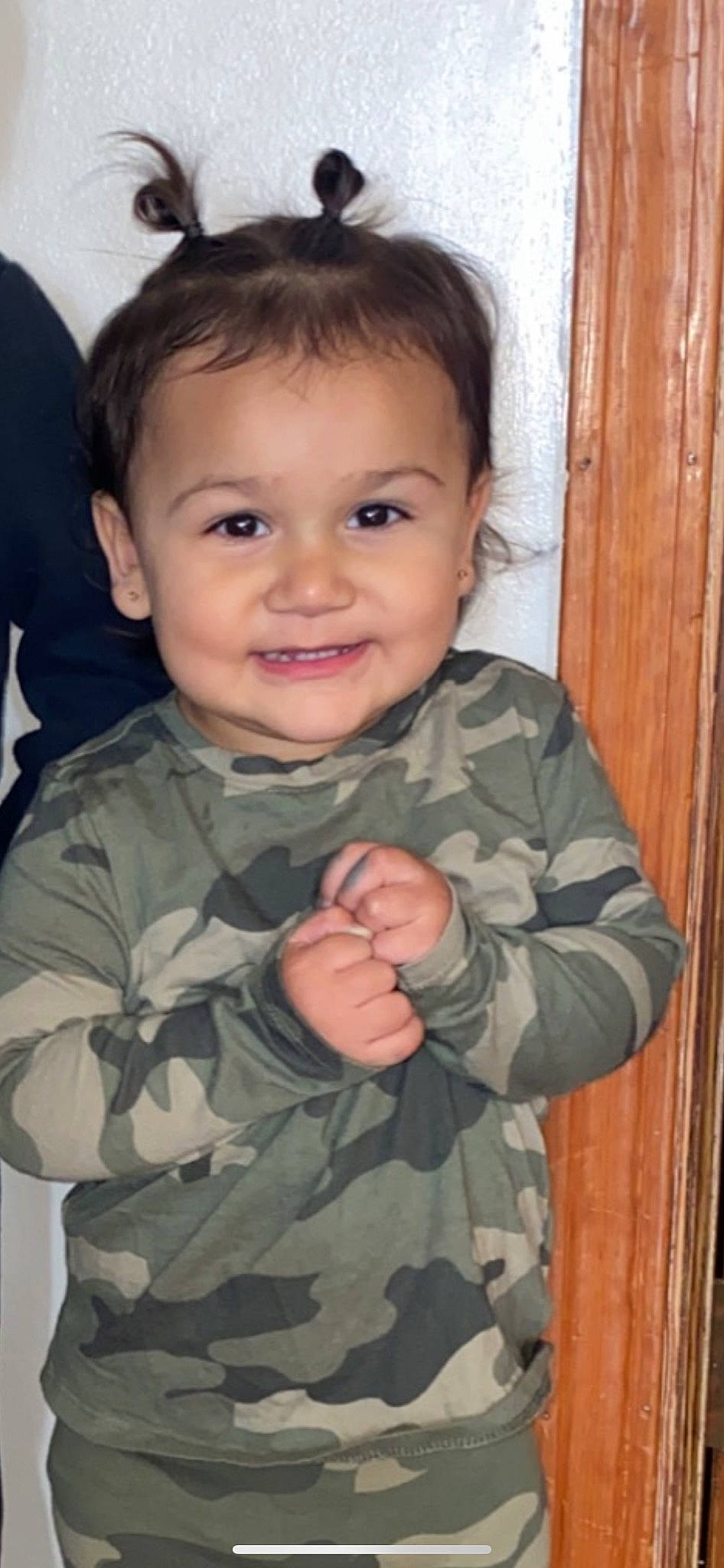 Addalynn is registered to the contest to win money with this photo: camouflage, cheek, chin, eye, face, finger, forehead, gesture, hair, happy, head, joy, military_camouflage, military_uniform, nose, organ, person, skin, sleeve, smile