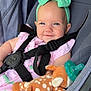 baby, smiling, headband, green_bow, stroller, nuna, harness, plush_toy, deer_toy, pacifier, pink_clothing, child, infant, seat, fabric, cute, happy, closeup, person, baby_accessory