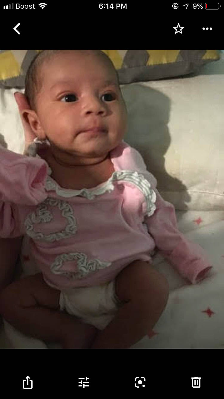 Jayla is registered to the contest to win money with this photo: baby, baby_toddler_clothing, cheek, child, chin, eye, face, facial_expression, forehead, fun, head, human, iris, lip, mouth, nose, person, pink, skin, smile