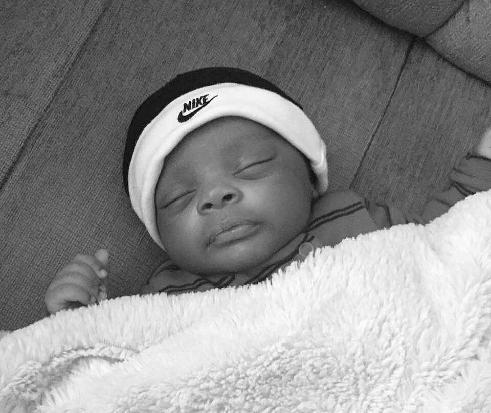 Amarion is registered to the contest to win money with this photo: baby, black_and_white, child, headgear, headwear, monochrome, monochrome_photography, person, photograph, photography, portrait_photography, smile, style, toddler, white