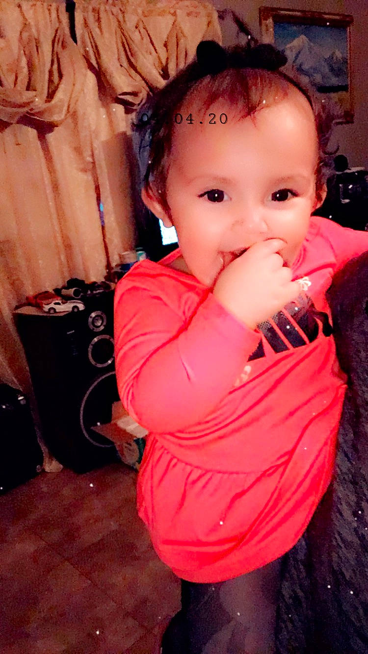 Evy joined the competition — help win amazing prizes! baby, cheek, child, face, lip, mouth, neck, nose, person, pink, skin, standing, toddler