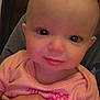 Addalynn Elizabeth is registered to the contest to win money with this photo: adorable, apparel, baby, child, closeup, cute, eyes, face, hand, holding, indoor, infant, person, pink_shirt, portrait, sitting, skin, smile, tattoo, young