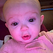 Addalynn Elizabeth is registered to the contest to win money with this photo: baby, child, infant, person, face, pink_clothing, closeup, indoors, portrait, young_child, human, head, expression, wide_eyes, cute, skin, eyelashes, mouth, nose, adult_partial