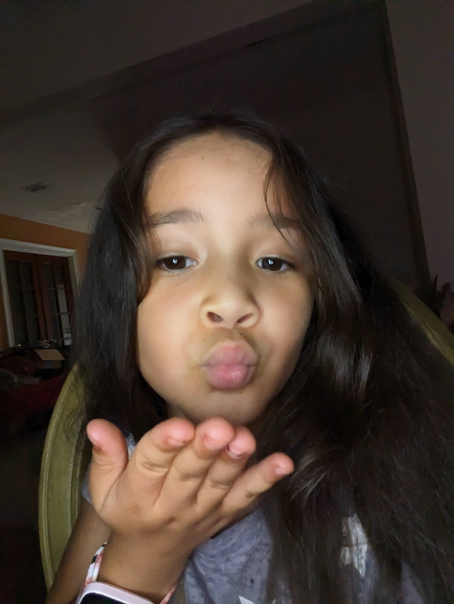 Solana is registered to the contest to win money with this photo: black_hair, bookcase, cheek, chin, eyebrow, eyelash, facial_expression, finger, flash_photography, fun, gesture, happy, jaw, lip, mouth, nose, person, shelf, skin, smile