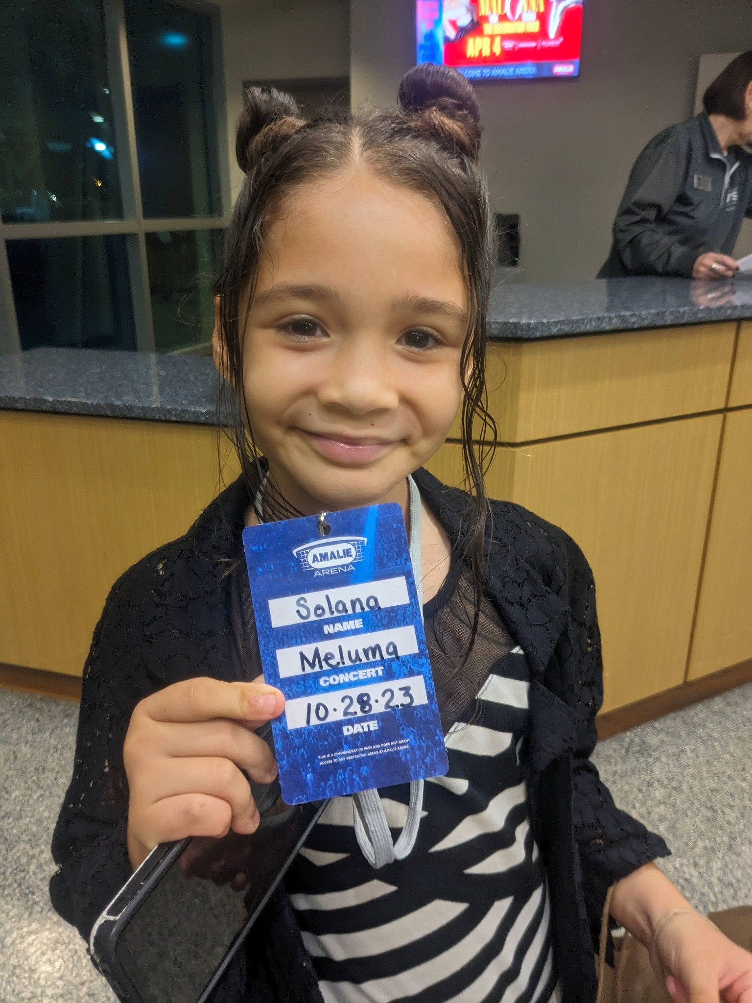 Solana is registered to the contest to win money with this photo: audio_equipment, child, display_device, electric_blue, employment, event, fun, job, joy, led_backlit_lcd_display, person, recreation, room, sleeve, smile, t_shirt, television, thumb, toddler, uniform