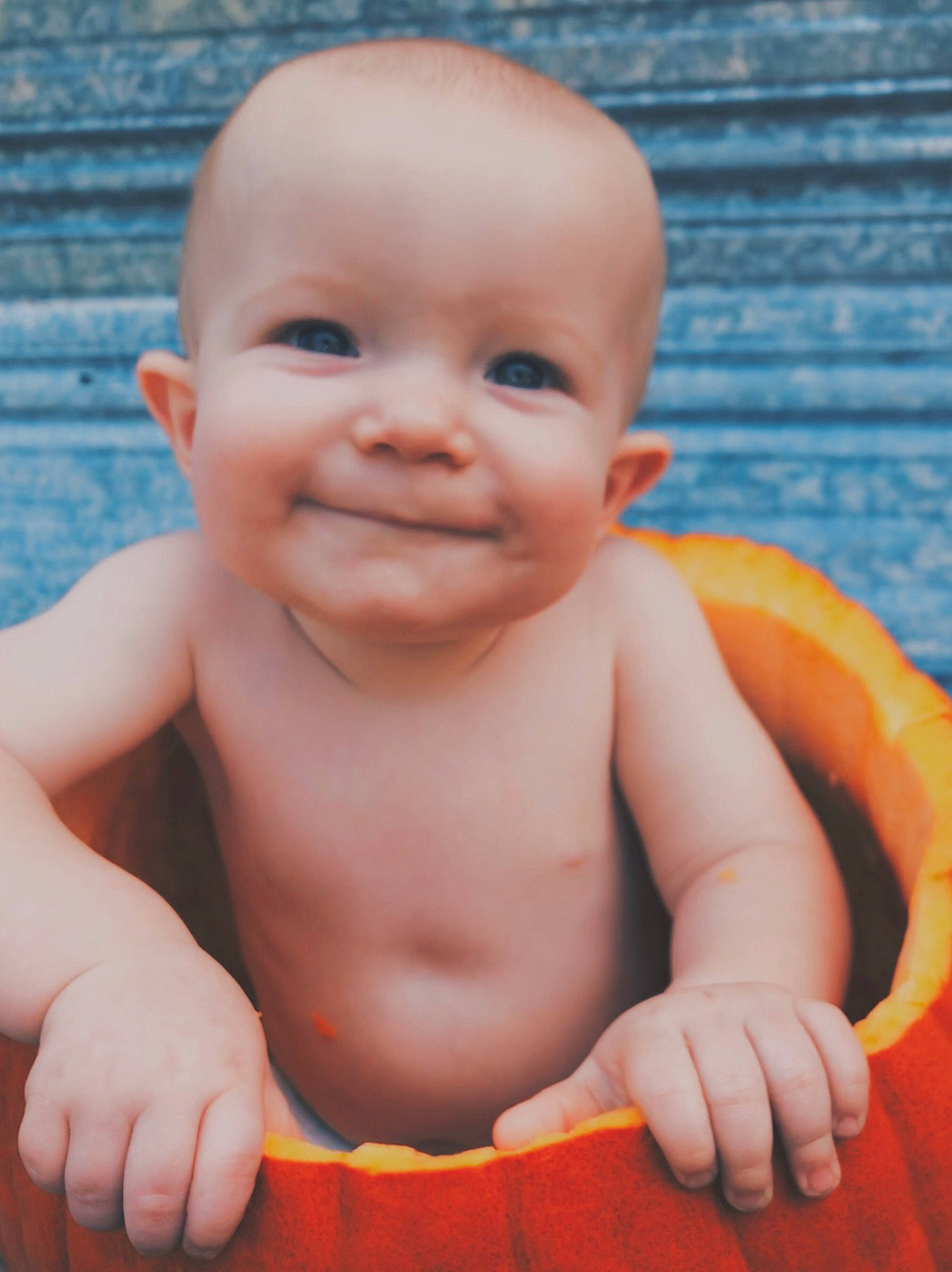 Hudson is registered to the contest to win money with this photo: baby, baby_bathing, baby_making_funny_faces, cheek, child, eye, face, facial_expression, fun, head, joy, lip, mouth, muscle, nose, orange, person, skin, smile, toddler