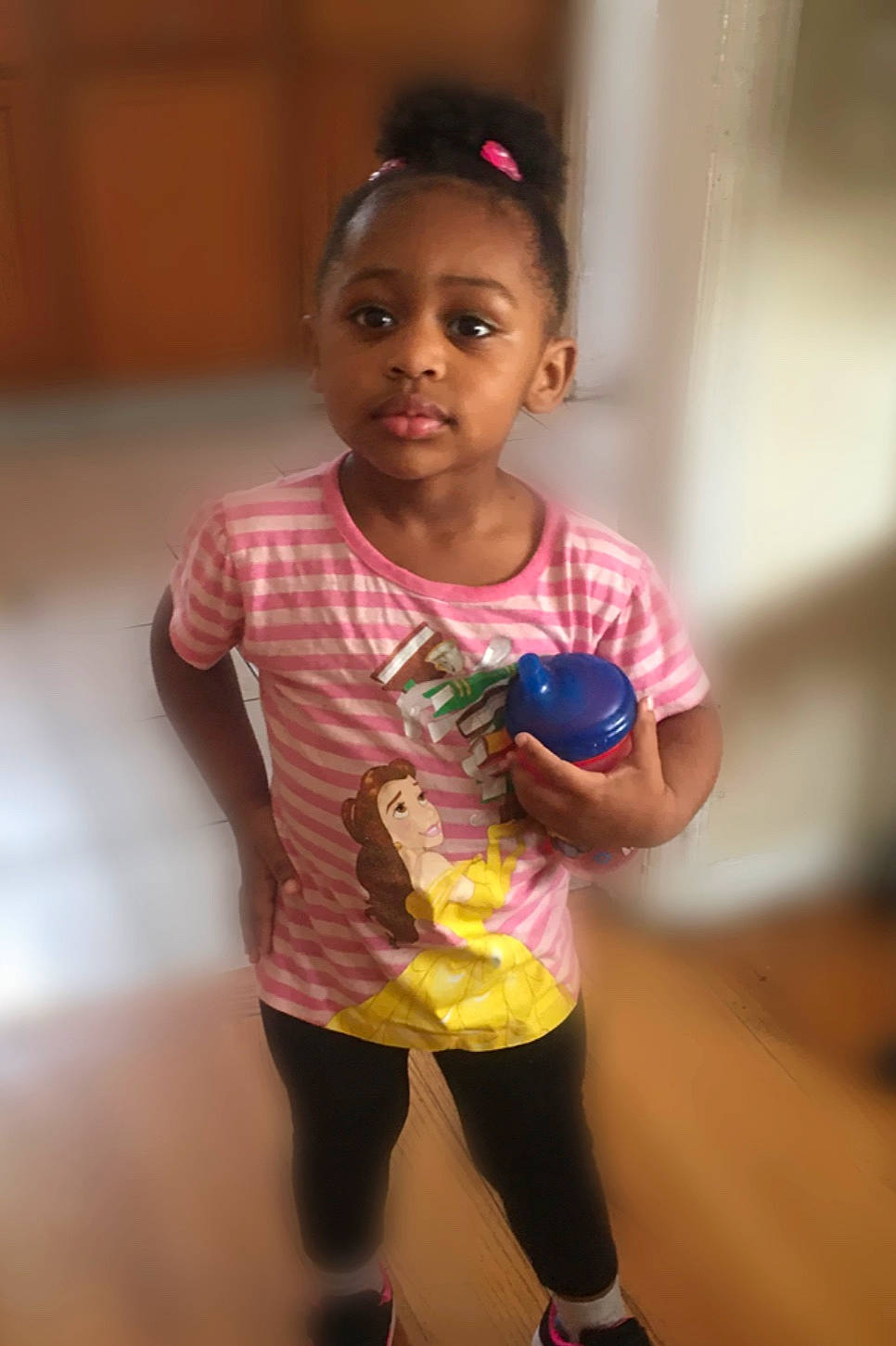 Kiara is registered to the contest to win money with this photo: cheek, child, fun, person, play, skin, smile, standing, toddler, yellow