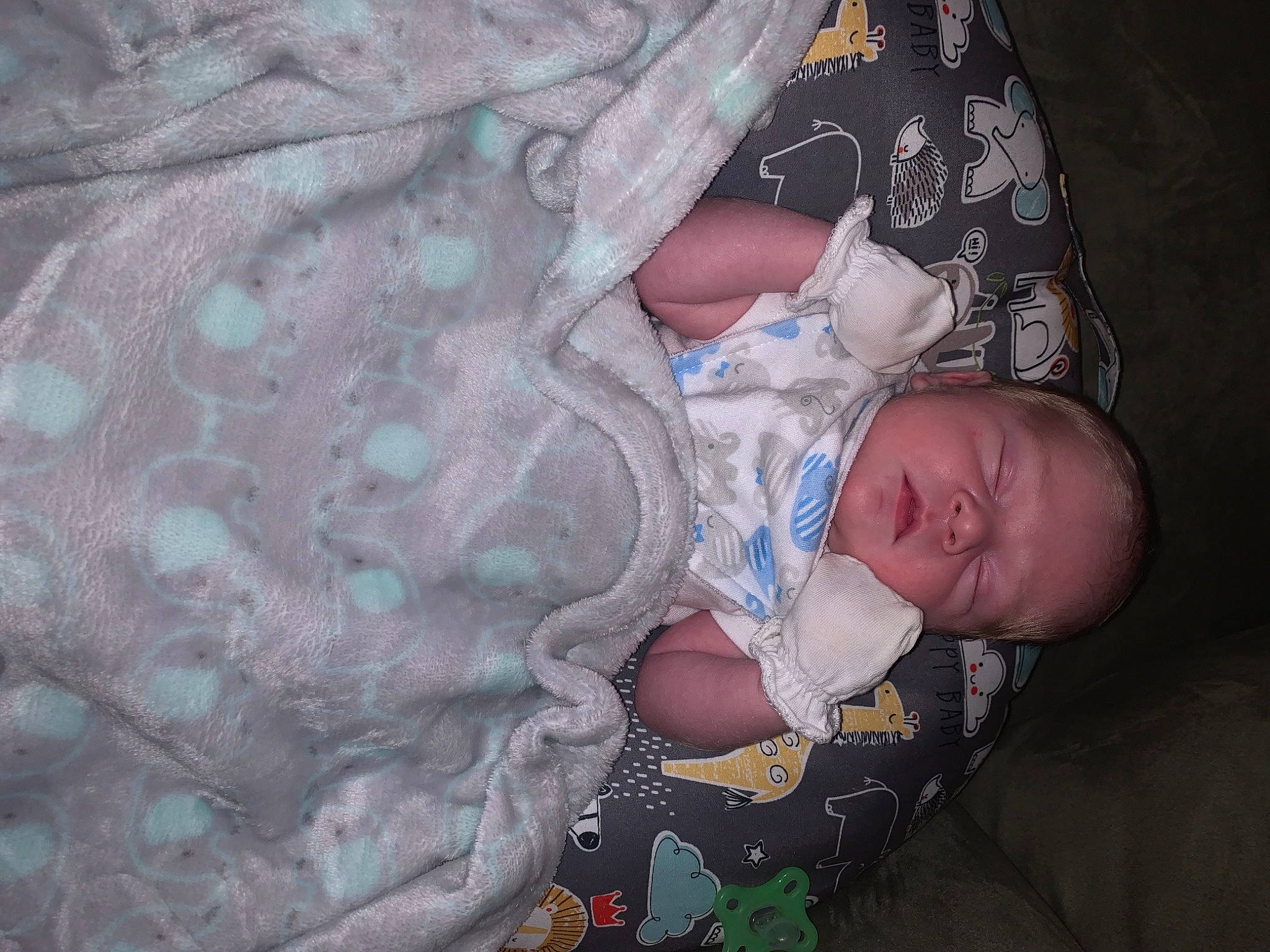 Braylon is registered to the contest to win money with this photo: baby, baby_products, baby_sleeping, baby_toddler_clothing, bedtime, camouflage, cheek, child, comfort, human, military_camouflage, nap, person, sleep, toddler