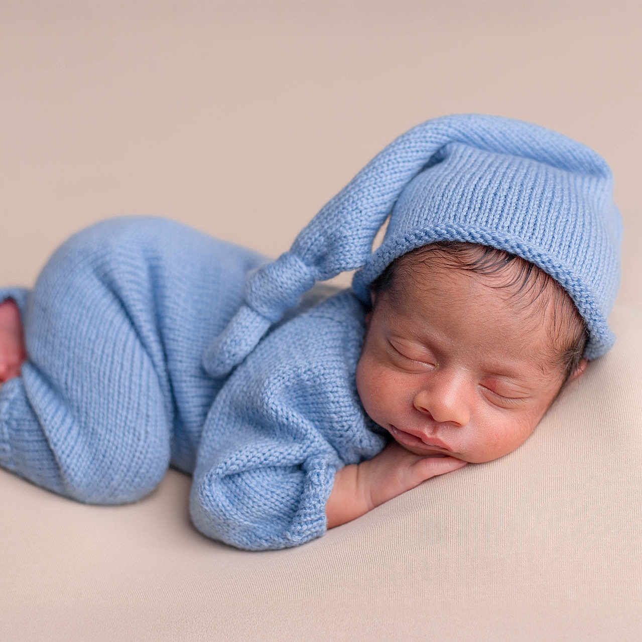 Aarnik is registered to the contest to win money with this photo: baby, beanie, blanket, bodypart, bonnet, cap, clothing, face, finger, happy, hat, head, knitwear, newborn, person, photography, portrait, sleeping, smile, sweater