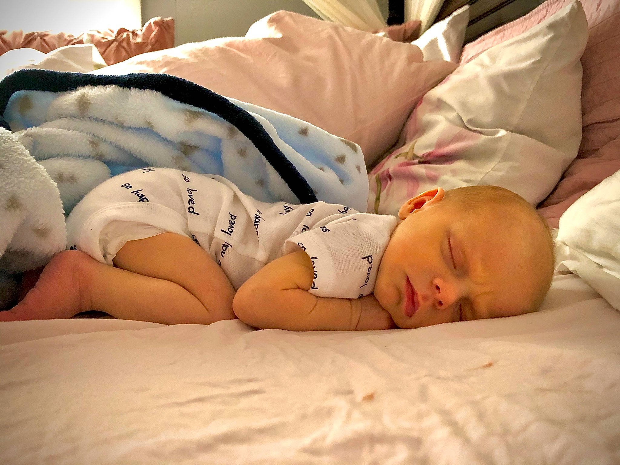 Elon joined the competition — help win amazing prizes! baby, baby_sleeping, bed_sheet, bedding, bedtime, child, comfort, elbow, eye, human, human_leg, linens, mammal, mouth, person, room, skin, thigh, toddler, vertebrate