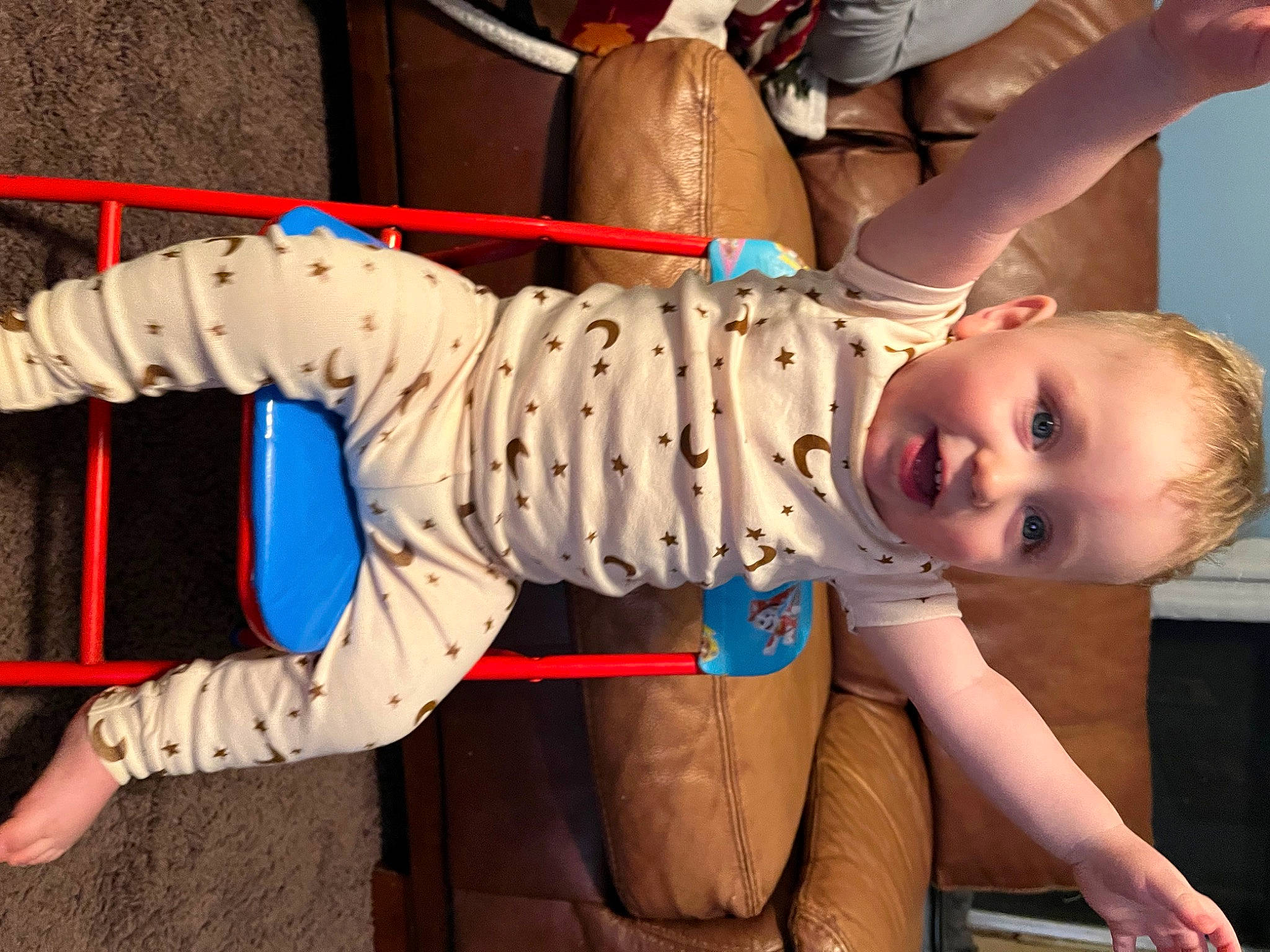 Braxton is registered to the contest to win money with this photo: abdomen, baby, carmine, chest, child, comfort, elbow, entertainment, foot, fun, fur, human_leg, joint, knee, mouth, person, sitting, thigh, thumb, toddler