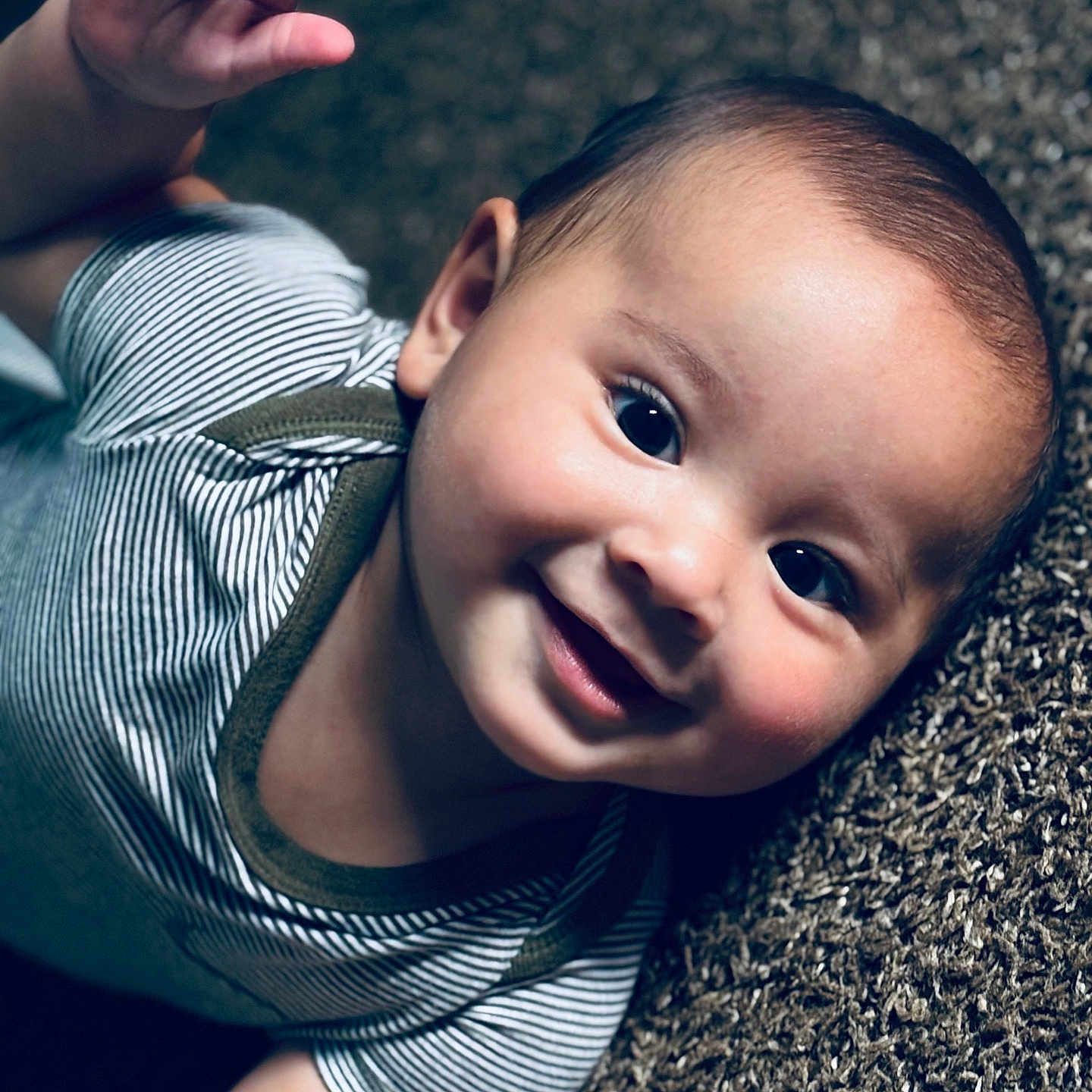Kasiah joined the competition — help win amazing prizes! baby, carpet, child, closeup, cute, expression, eyes, face, hand, happy, indoors, infant, lying_down, onesie, person, portrait, skin, smile, striped_clothing, young
