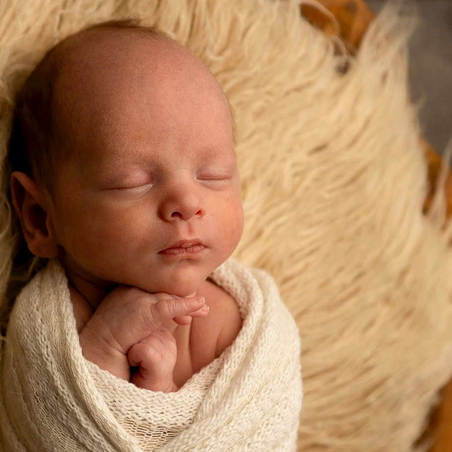 A-J joined the competition — help win amazing prizes! baby, blanket, face, happy, head, newborn, person, photography, portrait, sleeping, smile, towel, yawning