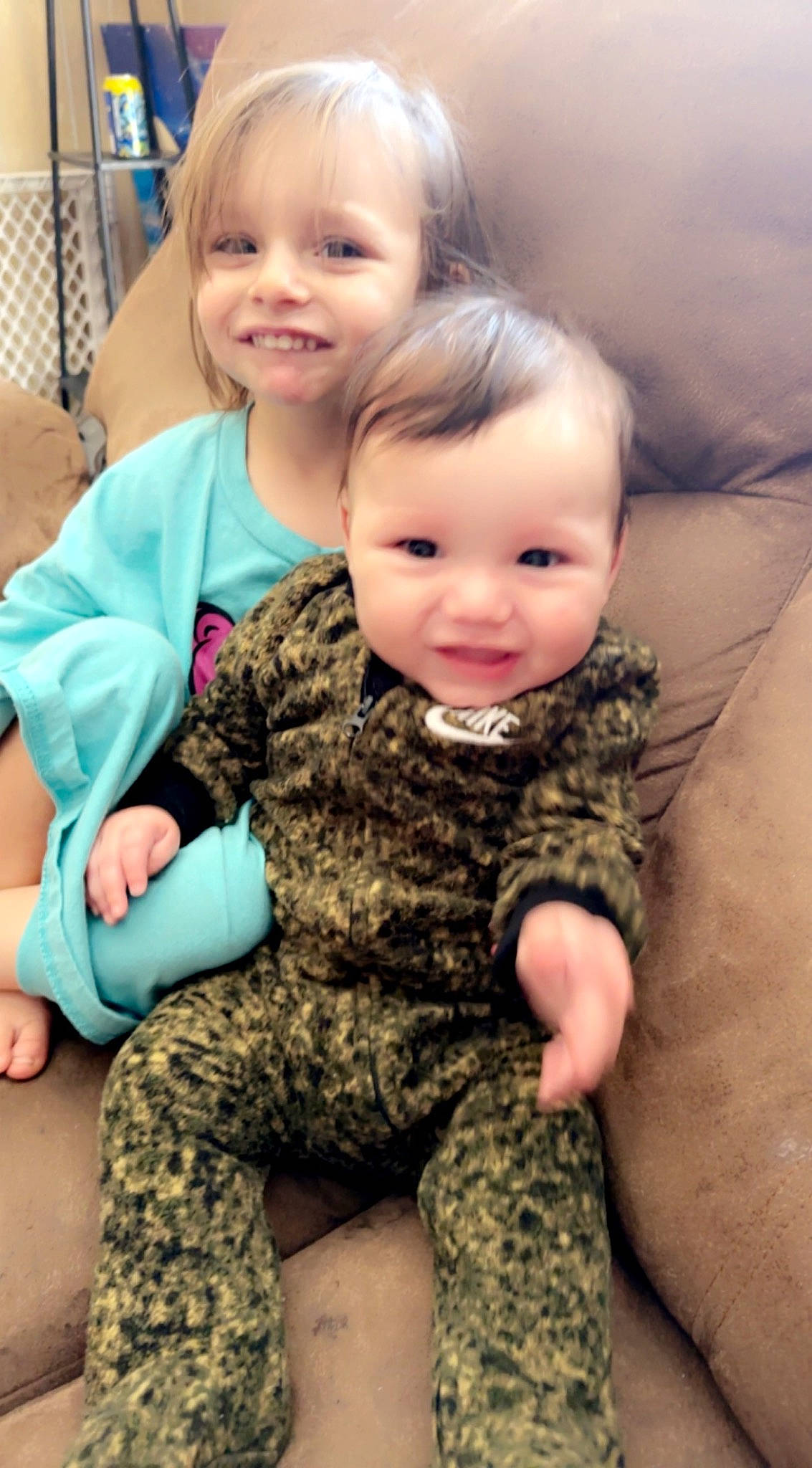 Zachary Jr is registered to the contest to win money with this photo: baby_toddler_clothing, camouflage, cheek, child, comfort, eye, facial_expression, finger, fun, gesture, hair, hairstyle, happy, head, joy, military_camouflage, people, person, skin, smile