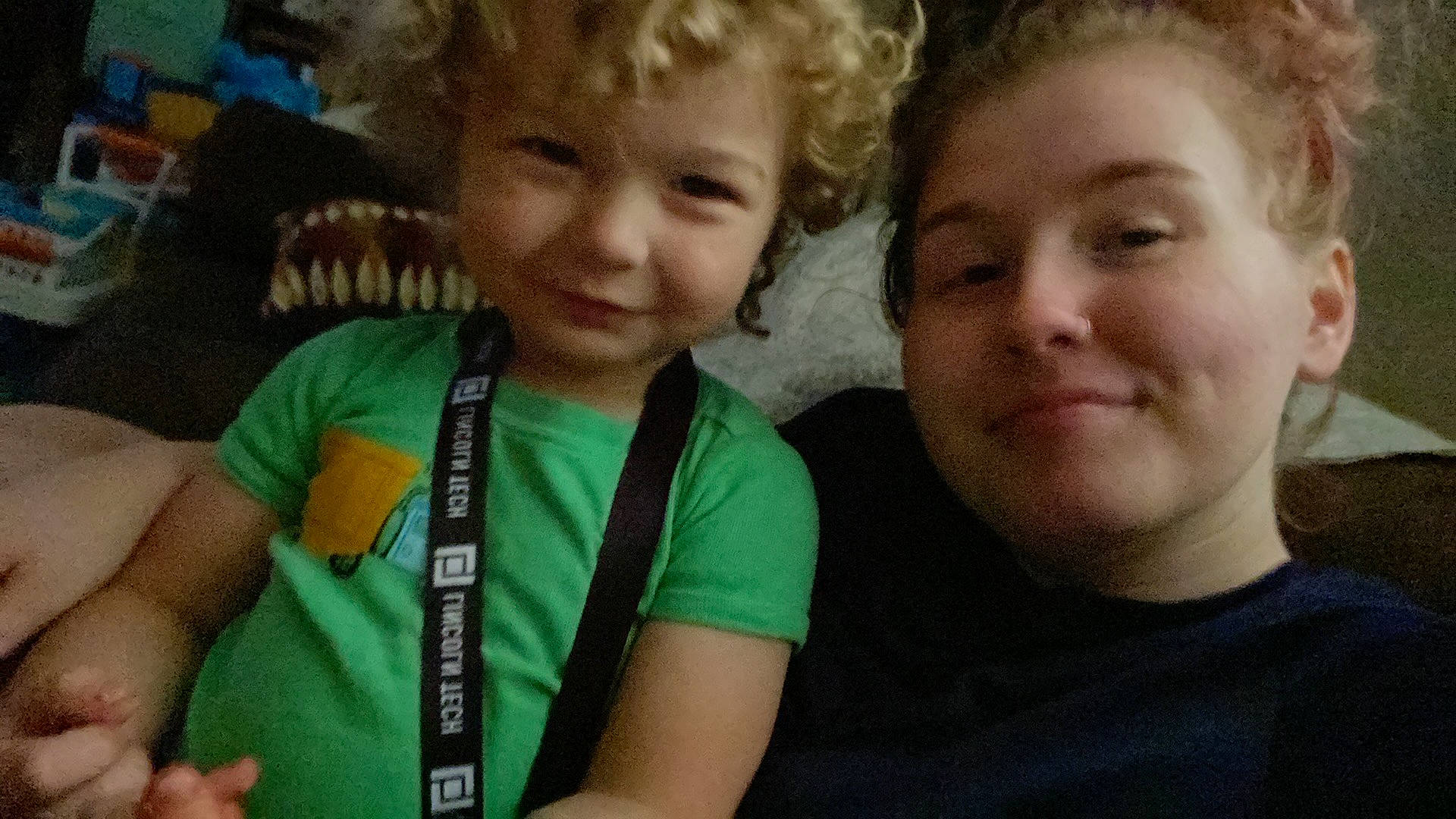 Declan is registered to the contest to win money with this photo: art, cheek, child, event, friendship, fun, grass, happy, human_body, iris, joy, leisure, mammal, nose, organ, people, person, sitting, smile, t_shirt