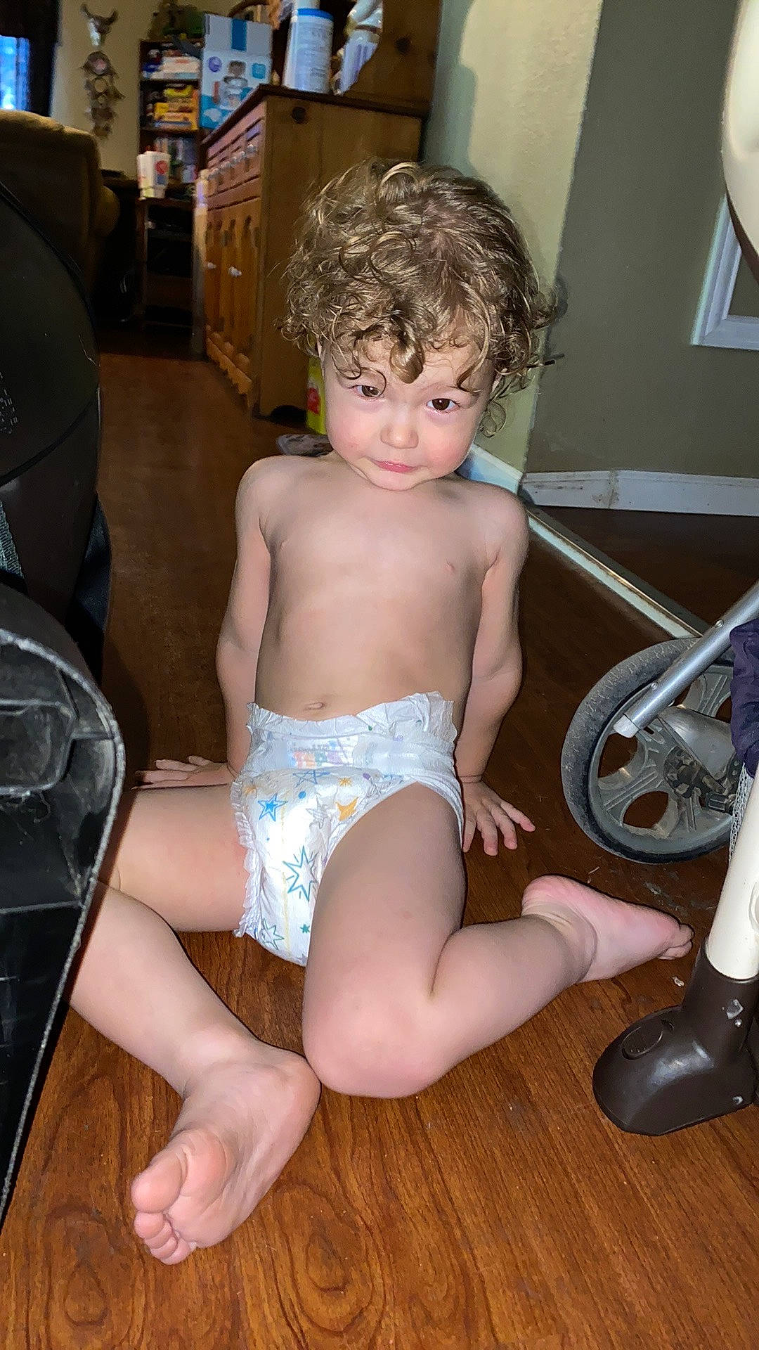 Declan joined the competition — help win amazing prizes! abdomen, chair, chest, flooring, foot, fun, head, human_leg, joint, knee, leg, muscle, person, shorts, shoulder, sitting, thigh, toddler, trunk, underpants