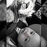 baby, baby_clothing, black_and_white, calm, car_safety, car_seat, child, close_up, cute, expression, face, indoor, infant, lion_toy, monochrome, portrait, seatbelt, soft_toy, stuffed_animal, young_child
