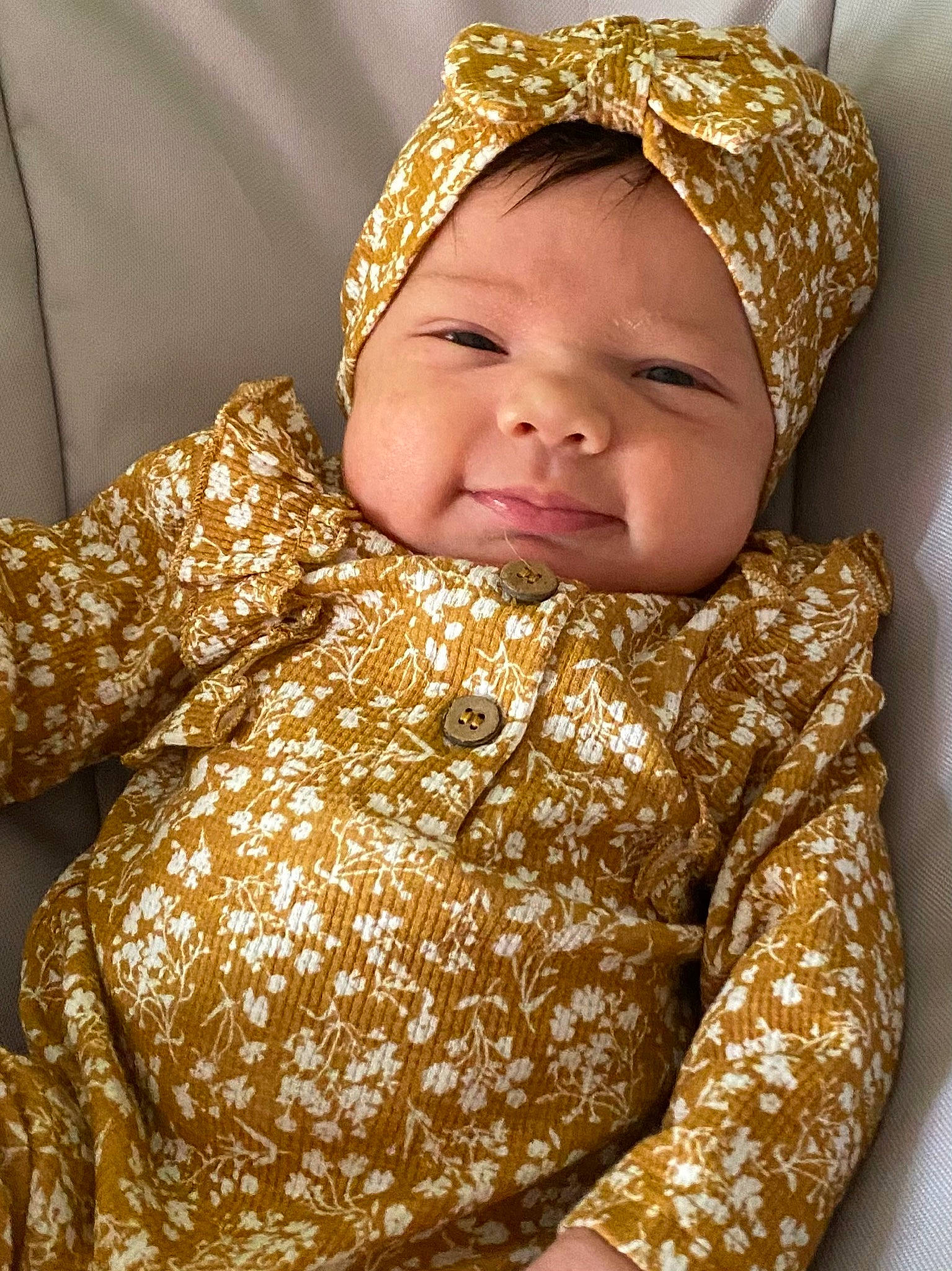 Kyara is registered to the contest to win money with this photo: baby, child, headgear, headwear, outerwear, person, skin, toddler, yellow