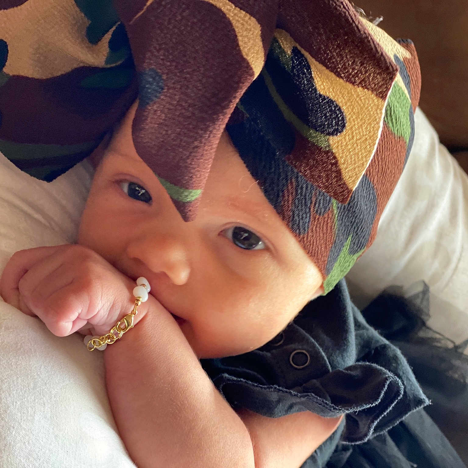 Kyara is registered to the contest to win money with this photo: baby, beauty, cheek, child, close_up, cool, eye, face, fashion_accessory, finger, hair_accessory, hand, head, headgear, lip, nose, photography, skin, smile, toddler