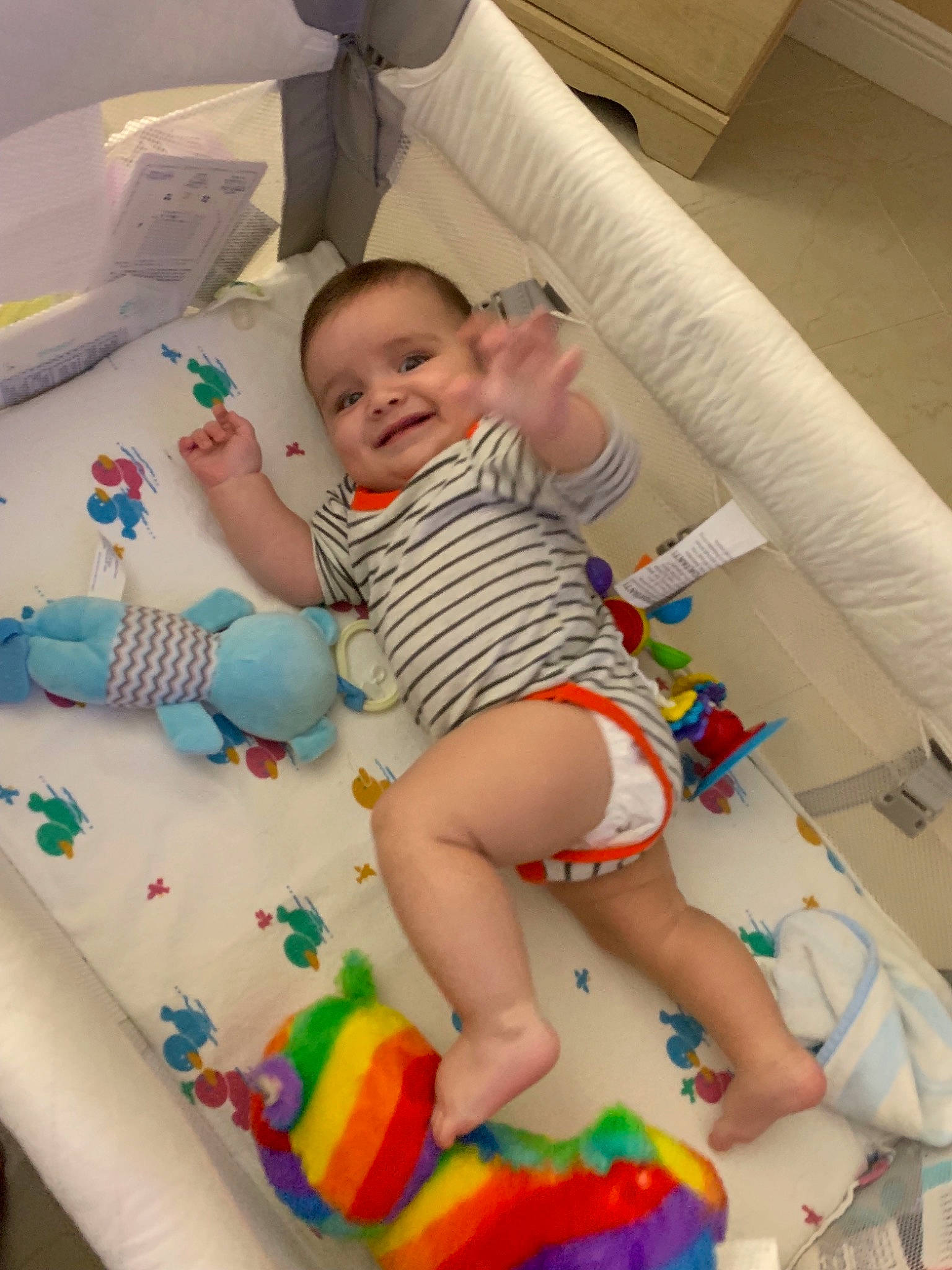 Zayd is registered to the contest to win money with this photo: arm, baby_products, bed, cheek, child, day, finger, fun, girl, hand, infant, iris, joy, leg, mouth, person, play, product, skin, toddler
