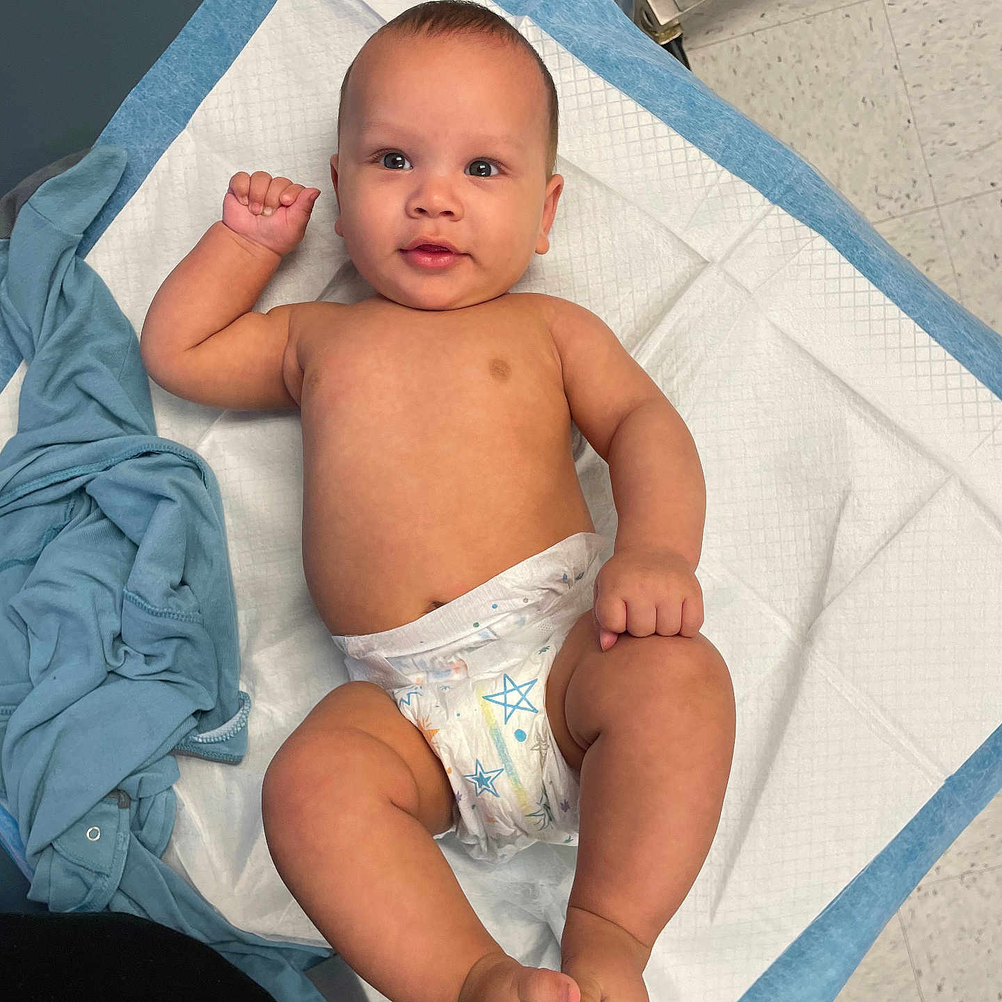 Zahyir is registered to the contest to win money with this photo: architecture, baby, bed, blanket, bodypart, clothing, diaper, face, finger, furniture, hand, head, newborn, pants, person, photography, portrait, shorts, sitting, towel