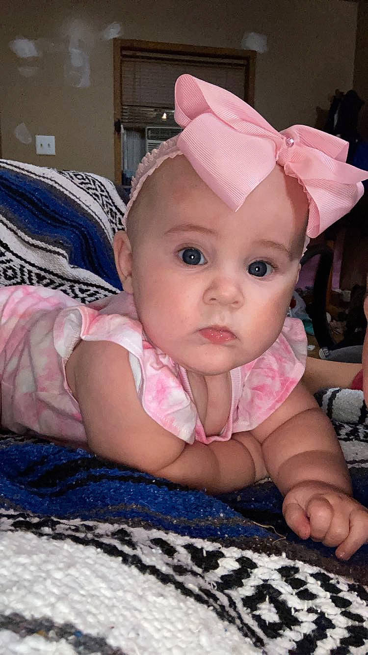 Stella Rose is registered to the contest to win money with this photo: baby, baby_toddler_clothing, cap, cheek, chin, eye, eyebrow, eyelash, fun, happy, headband, headpiece, headwear, iris, mammal, person, pink, product, purple, skin