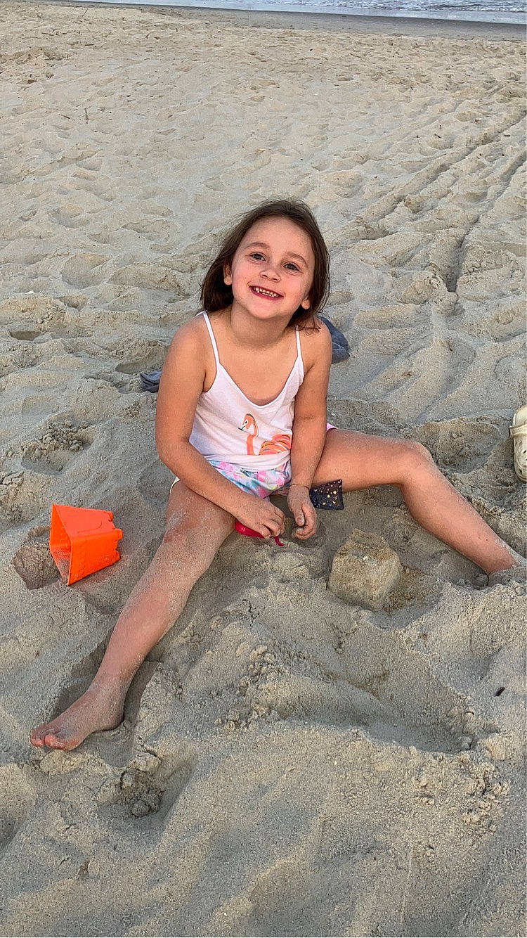 Emma Grace joined the competition — help win amazing prizes! barefoot, beach, face, finger, flash_photography, foot, fun, hair, hand, happy, head, human_body, human_leg, joy, leg, leisure, people_in_nature, person, sand, shorts