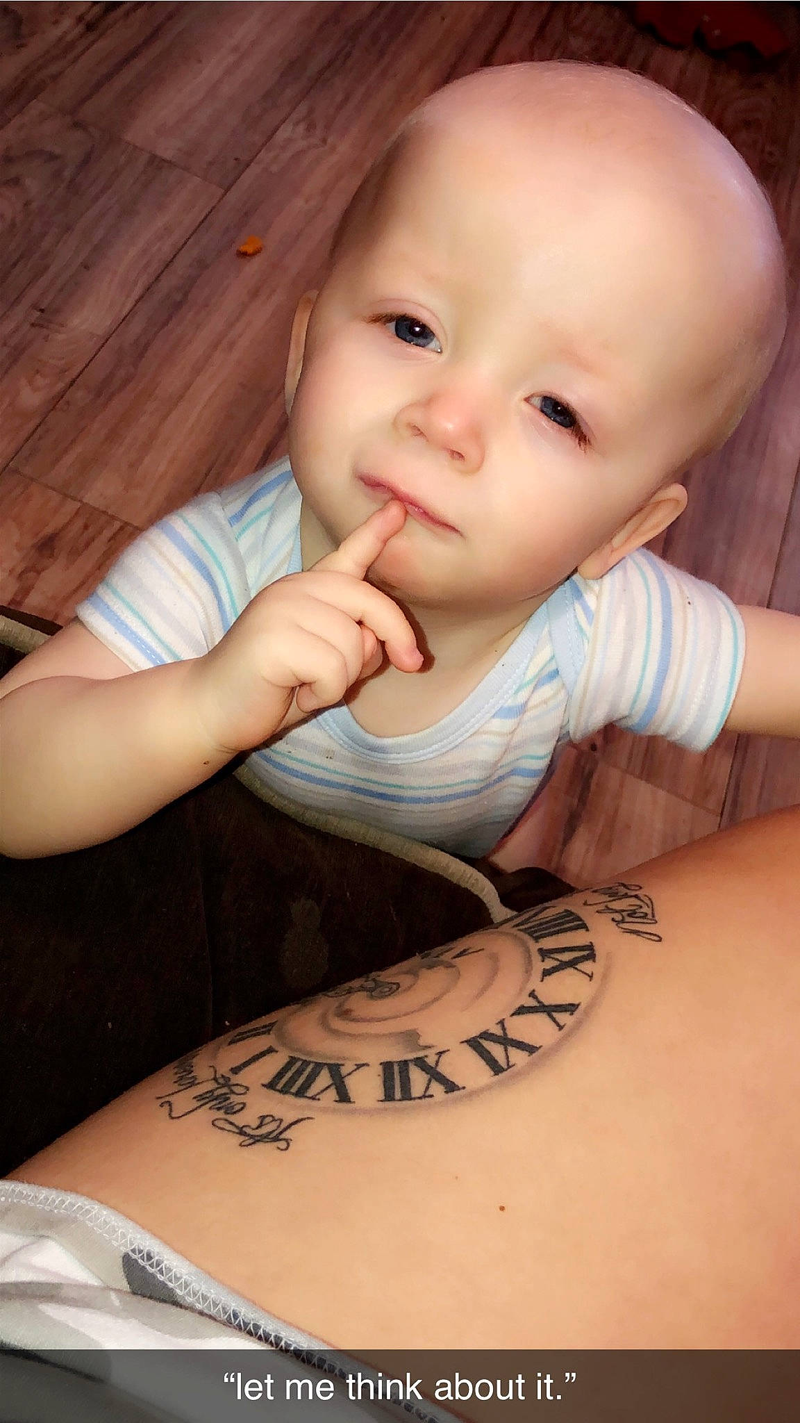Waylon is registered to the contest to win money with this photo: arm, baby, cheek, child, chin, eye, face, finger, forehead, hand, head, mouth, muscle, nose, person, skin, smile, tattoo, temporary_tattoo, toddler