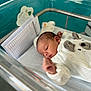 architecture, baby, bed, building, cradle, crib, face, furniture, head, hospital, infantbed, newborn, person