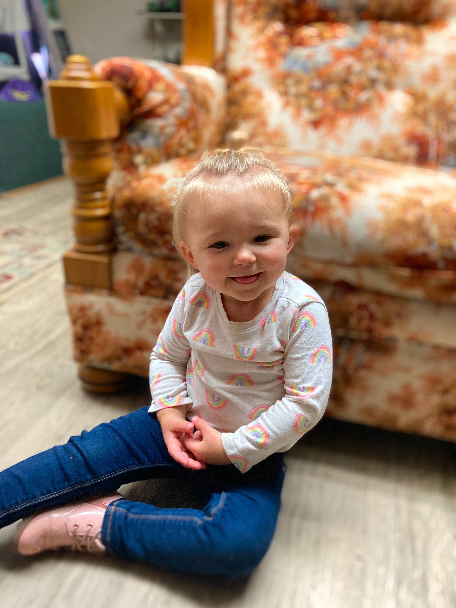 Rose is registered to the contest to win money with this photo: baby, baby_toddler_clothing, child, denim, floor, flooring, fun, grass, happy, hardwood, jeans, leg, leisure, people, person, play, sitting, smile, toddler, wood