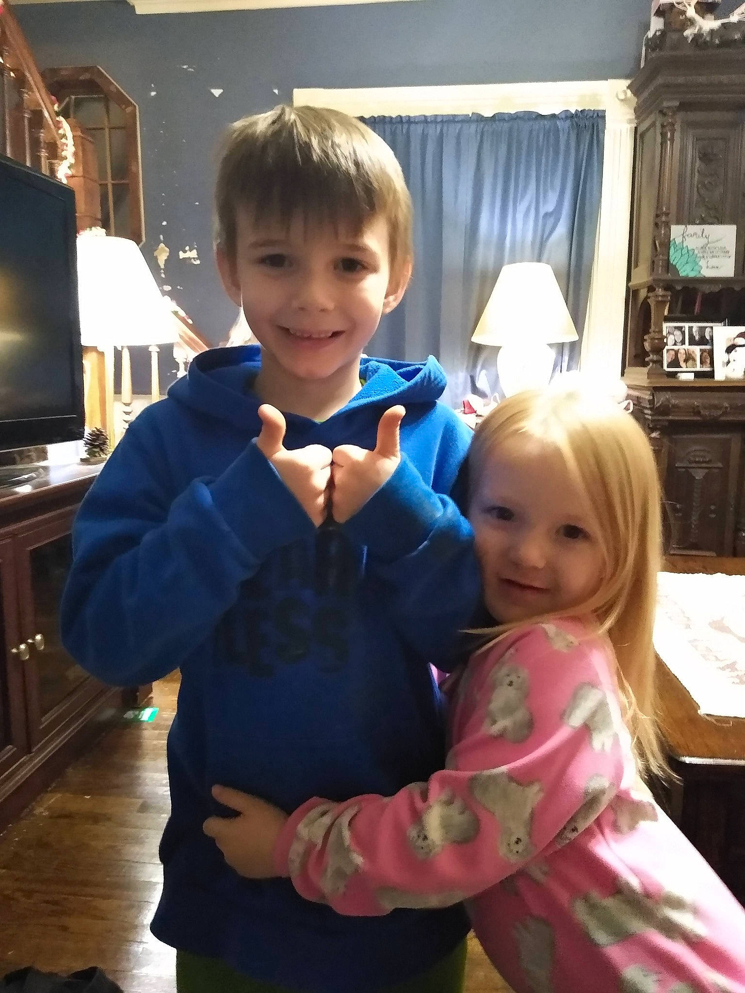 Logan is registered to the contest to win money with this photo: baby_toddler_clothing, child, computer_keyboard, computer_monitor, curtain, event, facial_expression, formal_wear, fun, gesture, happy, home_appliance, iris, joy, lamp, person, picture_frame, shoulder, smile, suit