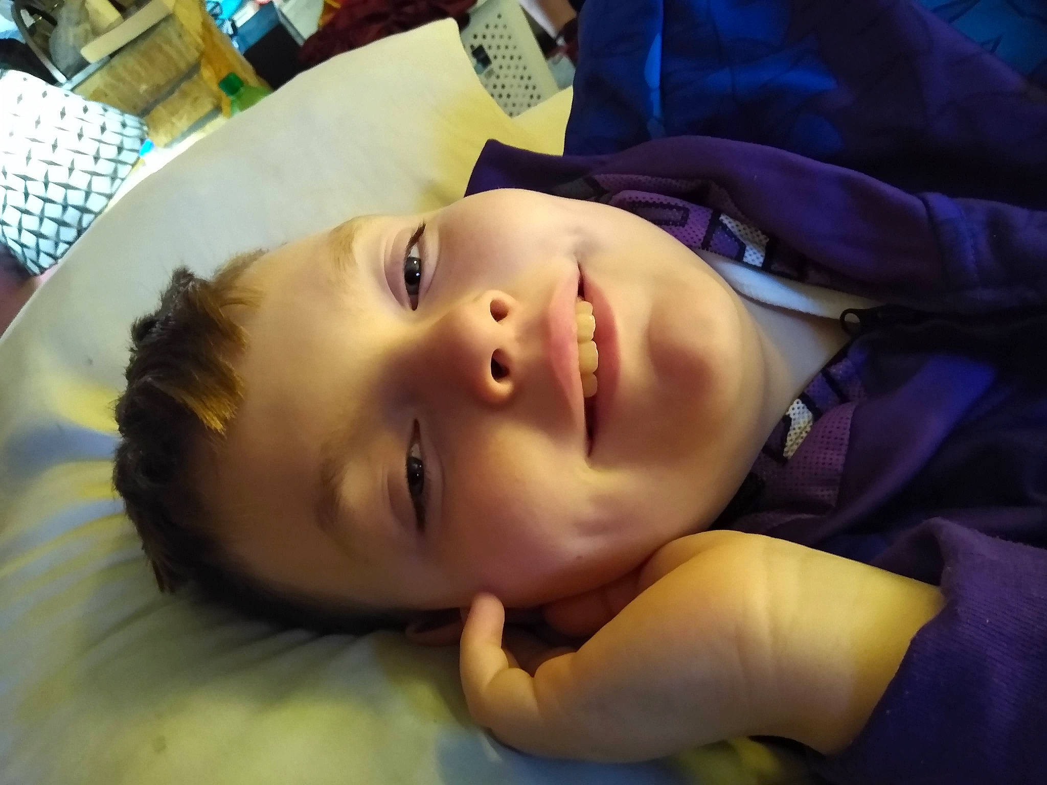 Michael is registered to the contest to win money with this photo: baby, black_hair, cheek, child, eyebrow, eyelash, flash_photography, fun, grass, happy, hat, iris, lip, mouth, neck, nose, person, portrait_photography, skin, smile