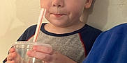 Hunter joined the competition — help win amazing prizes! child, boy, indoor, mickey_mouse, cup, straw, drink, tshirt, person, face, short_hair, window_blind, hand, wall, casual_clothing, young, expression, holding, blue_clothing, portrait