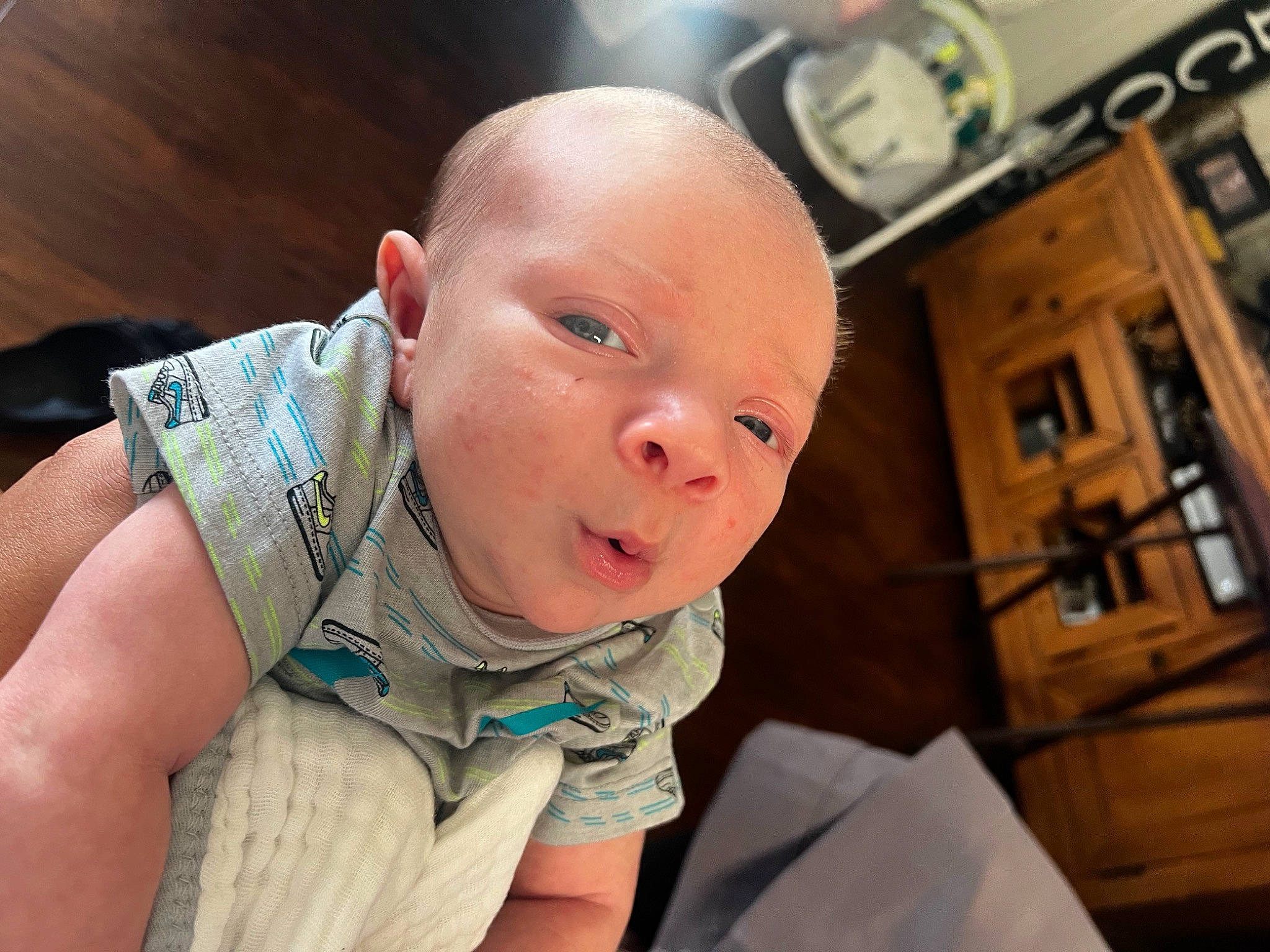 Zaedyn is registered to the contest to win money with this photo: baby, baby_products, baby_toddler_clothing, cheek, child, comfort, ear, fun, happy, human_body, linens, nail, person, picture_frame, room, sitting, skin, sleeve, thumb, toddler