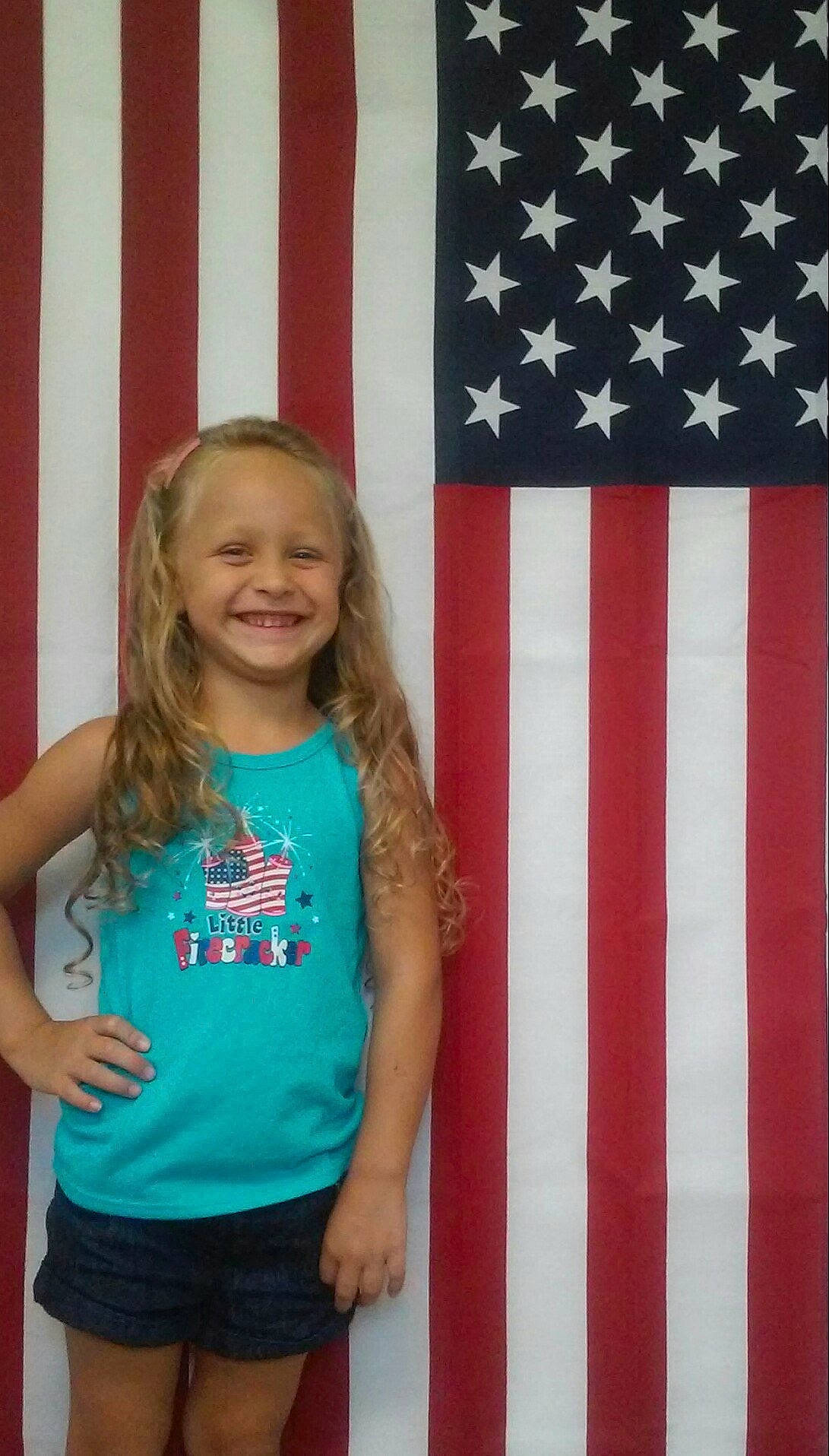 Serenity is registered to the contest to win money with this photo: flag, flag_of_the_united_states, joy, pattern, person, textile