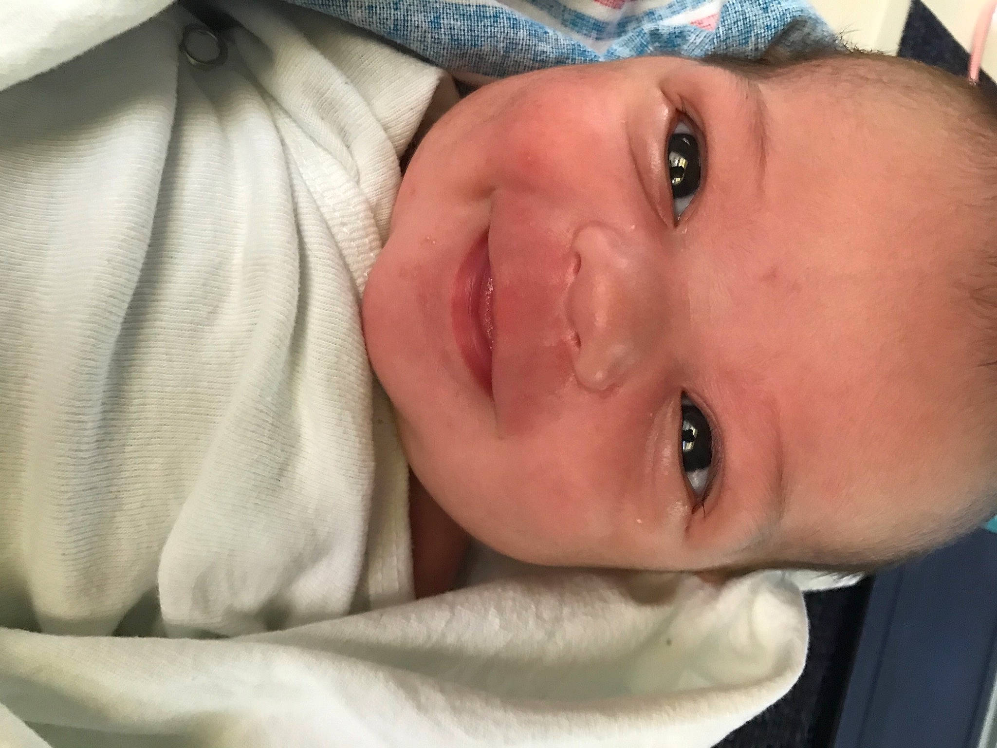 Julio is registered to the contest to win money with this photo: baby, cheek, child, chin, close_up, ear, eye, face, facial_expression, forehead, head, joy, lip, mouth, nose, person, skin, smile, toddler