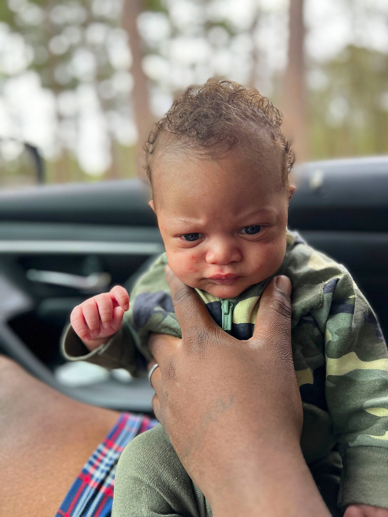 Braelyn is registered to the contest to win money with this photo: arm, auto_part, baby, car, eyebrow, eyelash, finger, fun, gesture, glass, grass, hand, happy, lip, motor_vehicle, person, plant, skin, thumb, toddler