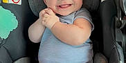 Jace joined the competition — help win amazing prizes! baby, infant, car_seat, smiling, happy, blue_eyes, plush_toy, clothing, onesie, cute, child, sitting, hands, feet, indoor, portrait, childcare, baby_toy, seatbelt, comfort