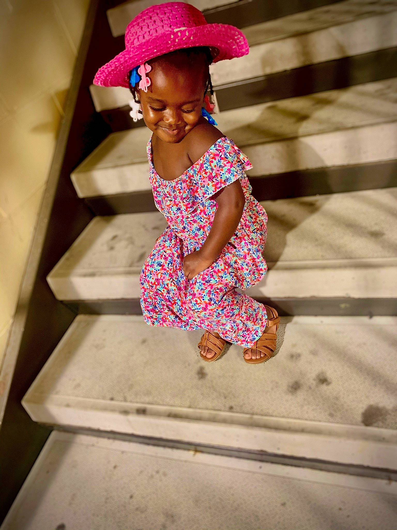 Annah is registered to the contest to win money with this photo: baby_toddler_clothing, cap, child, face, fun, happy, hat, head, human_leg, joy, leisure, magenta, pattern, person, pink, sleeve, street_fashion, sun_hat, tints_and_shades, toddler