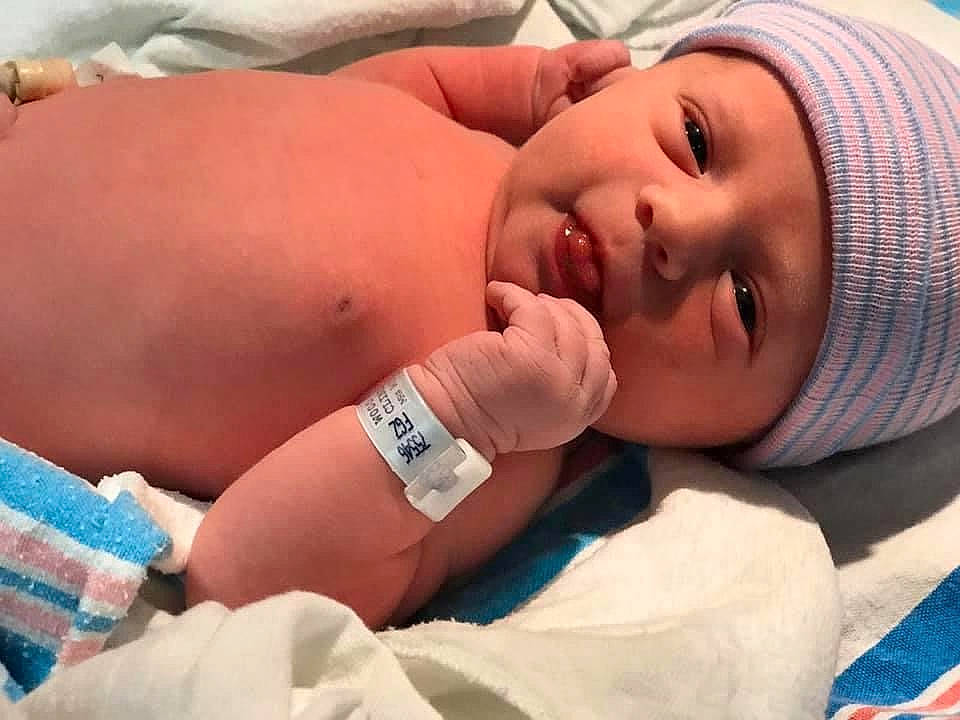 Danica is registered to the contest to win money with this photo: baby, birth, cheek, child, childbirth, eye, hand, headwear, mouth, nose, person, skin, toddler