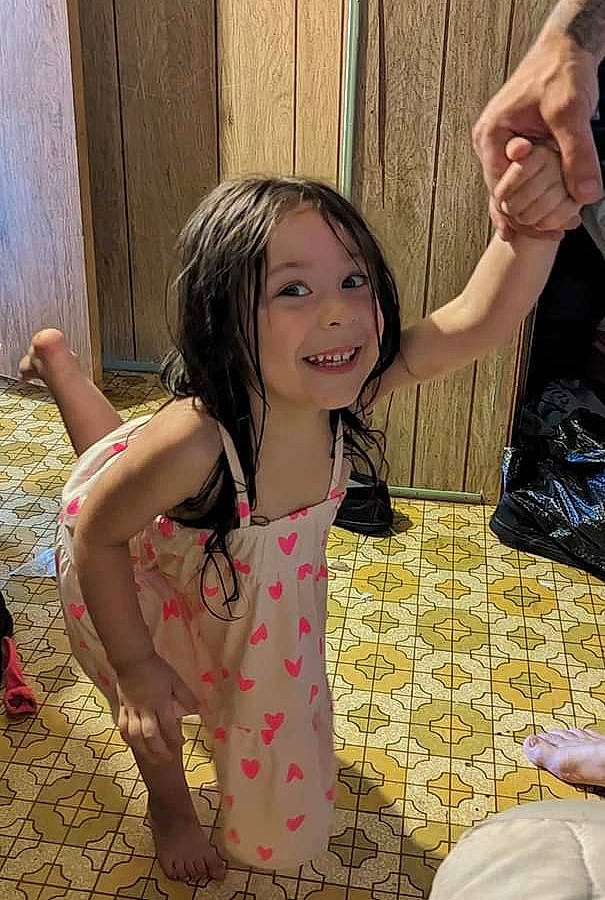 Victoria is registered to the contest to win money with this photo: black_hair, child, cool, facial_expression, finger, fun, gesture, hand, happy, human_body, joint, joy, leg, leisure, long_hair, person, shoulder, skin, smile, thigh